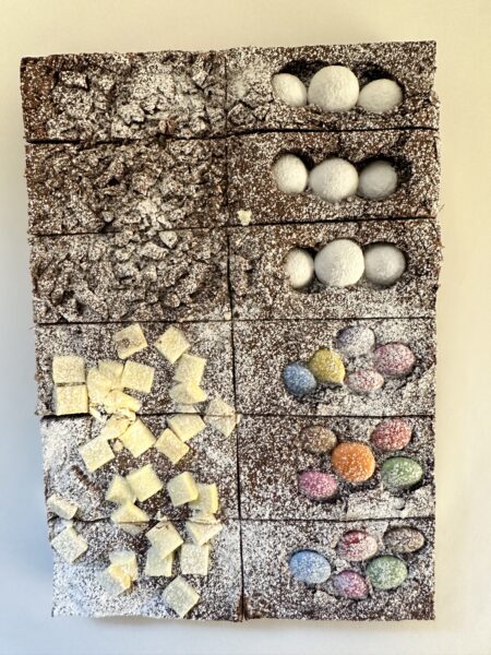 A mixed box of handmade brownies with flake, Cadbury Snowballs, Belgian white chocolate chips and Smarties